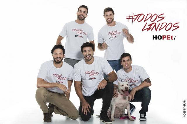 Projeto Hopet lança campanha para incentivar adoção de animais 3 Atletas com a pitbull Hara, mascote do projeto Hopet. (Foto: Debby Gram)
